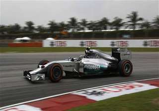 lewis hamilton takes pole at malaysian gp. -... lewis hamilton takes pole at malaysian gp. -...