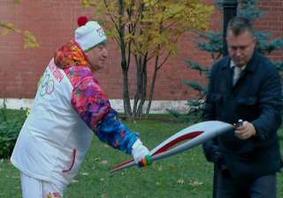 winter olympic torch begins 123 day relay from... winter olympic torch begins 123 day relay from...