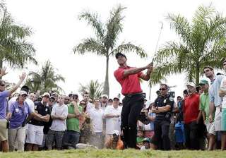 tiger woods pulls out of bay hill because of back... tiger woods pulls out of bay hill because of back...