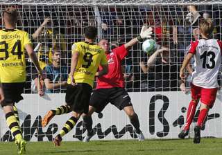 dortmund leverkusen progress in german cup -... dortmund leverkusen progress in german cup -...