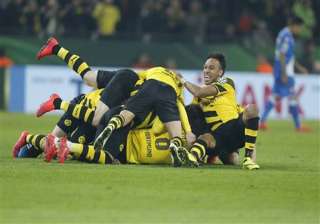 wolfsburg dortmund advance to german cup... wolfsburg dortmund advance to german cup...