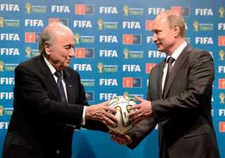 putin reassures blatter that russia can host 2018... putin reassures blatter that russia can host 2018...