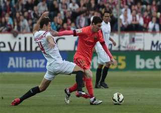 barcelona stumbles 2 2 at sevilla madrid cuts... barcelona stumbles 2 2 at sevilla madrid cuts...
