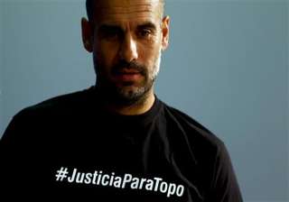 uefa charges bayern coach guardiola over t shirt... uefa charges bayern coach guardiola over t shirt...