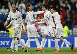 madrid faces challenge from valencia in title bid... madrid faces challenge from valencia in title bid...