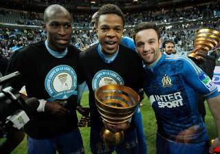 marseille lifts league cup after edging lyon -... marseille lifts league cup after edging lyon -...