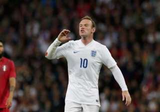 rooney feeling heat as england arrives in miami -... rooney feeling heat as england arrives in miami -...