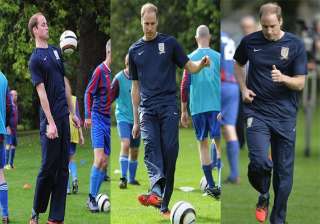 prince william wears wayne rooney s orange boots... prince william wears wayne rooney s orange boots...