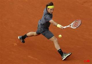 djokovic federer move on at french open - India TV djokovic federer move on at french open - India TV