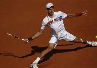 djokovic storms into quarter finals - India TV djokovic storms into quarter finals - India TV