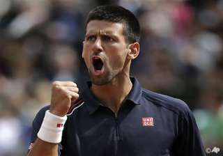 djokovic rallies from 2 sets down - India TV djokovic rallies from 2 sets down - India TV