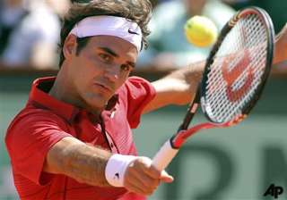 federer reaches quarterfinals at french open -... federer reaches quarterfinals at french open -...