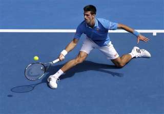 novak djokovic wins 1st round match at australian... novak djokovic wins 1st round match at australian...