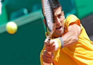 djokovic eases into 3rd round at monte carlo... djokovic eases into 3rd round at monte carlo...