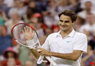 roger federer rallies past benneteau at wimbledon... roger federer rallies past benneteau at wimbledon...