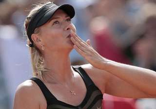 sharapova overcomes serving to reach french qf -... sharapova overcomes serving to reach french qf -...