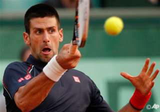 top ranked players race the clock at french open... top ranked players race the clock at french open...