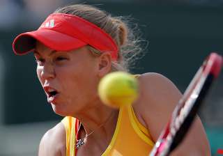 wozniacki knocked out in 3rd round of french open... wozniacki knocked out in 3rd round of french open...