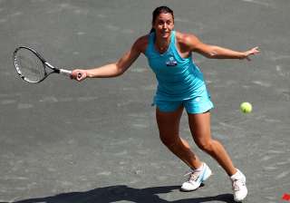 3rd seed bartoli holds on at family circle -... 3rd seed bartoli holds on at family circle -...