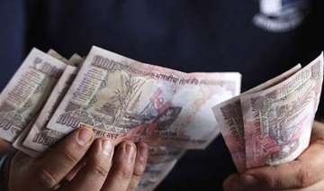 rupee trims initial losses still down 59 paise at... rupee trims initial losses still down 59 paise at...