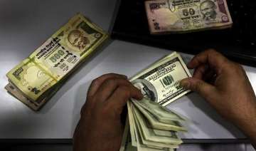 rupee down 29 paise against dollar in early trade... rupee down 29 paise against dollar in early trade...