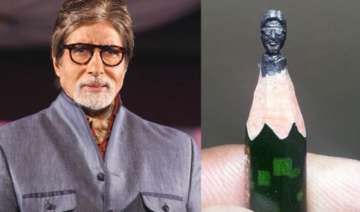 artist carves amitabh bachchan s sculpture on... artist carves amitabh bachchan s sculpture on...