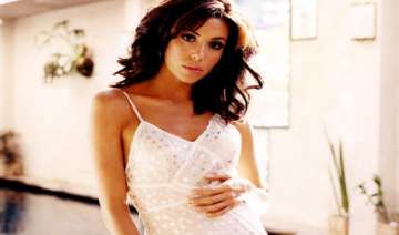 eva longoria pops out of her plunging jacket... eva longoria pops out of her plunging jacket...