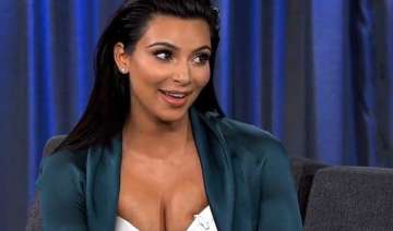 kim kardashian flaunts baby bump while exercising... kim kardashian flaunts baby bump while exercising...