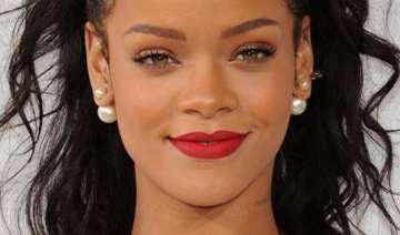 rihanna flaunts skin at barbados carnival parade... rihanna flaunts skin at barbados carnival parade...