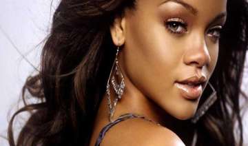 rihanna wastes money on yachts jets - India TV rihanna wastes money on yachts jets - India TV