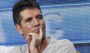 simon cowell to offer child support - India TV simon cowell to offer child support - India TV