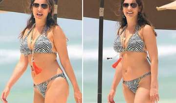 kelly brook soaks up the sun in greece view pics... kelly brook soaks up the sun in greece view pics...