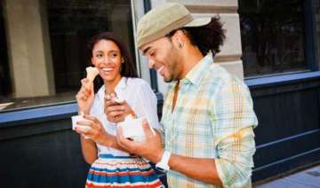 eating on the go could make you fat - India TV eating on the go could make you fat - India TV