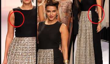 neha dhupia flaunts out of shape body at lakme... neha dhupia flaunts out of shape body at lakme...