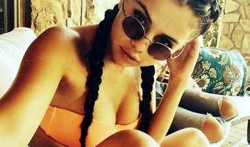 brave selena gomez posts selfie in skimpy orange... brave selena gomez posts selfie in skimpy orange...