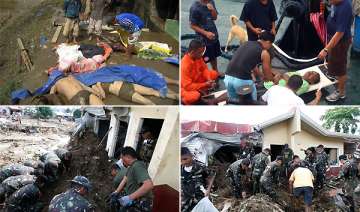 battle for philippine flood rescuers as bodies... battle for philippine flood rescuers as bodies...