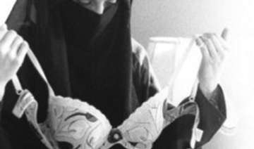 furore in canada over art pic of veiled muslim... furore in canada over art pic of veiled muslim...