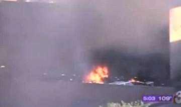 plane crashes into building at phoenix airport in... plane crashes into building at phoenix airport in...