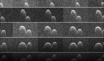 nasa captures earth flyby of space peanut - India... nasa captures earth flyby of space peanut - India...