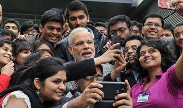 pm narendra modi clicks selfie with indian... pm narendra modi clicks selfie with indian...