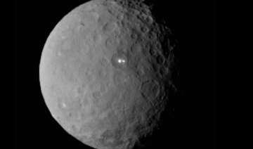 nasa probe sends stunning images of dwarf planet... nasa probe sends stunning images of dwarf planet...
