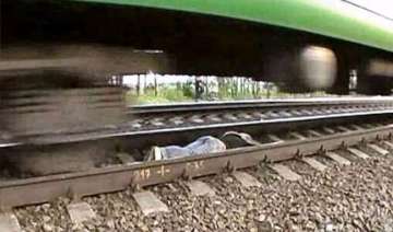russian girl lies on tracks as train speeds over... russian girl lies on tracks as train speeds over...