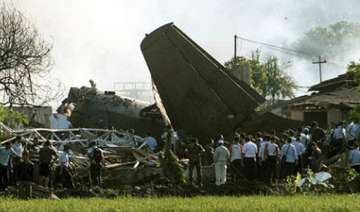 indonesia military plane crashes into houses... indonesia military plane crashes into houses...