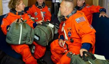 shuttle astronauts busy with space station... shuttle astronauts busy with space station...