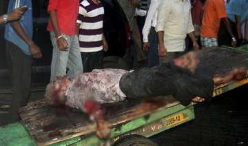 a deafening blast people lay in pool of blood -... a deafening blast people lay in pool of blood -...