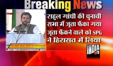 dehradun youth throws shoe at rahul gandhi during... dehradun youth throws shoe at rahul gandhi during...