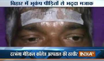 bihar hospital pastes bhukamp stickers on injured... bihar hospital pastes bhukamp stickers on injured...