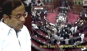 bjp uproar in rs over chidambaram s saffron... bjp uproar in rs over chidambaram s saffron...