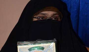 asiya andrabi addresses saeed rally over phone... asiya andrabi addresses saeed rally over phone...