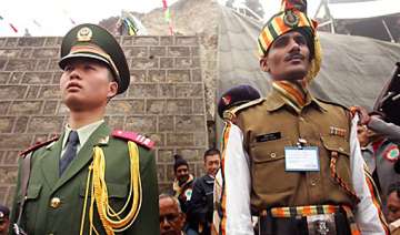 indian chinese troops exchange beer rasgullas... indian chinese troops exchange beer rasgullas...